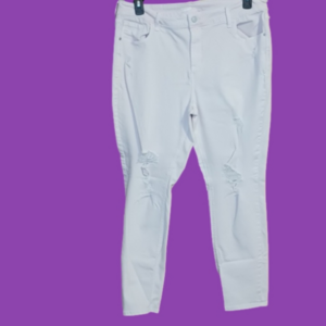 Pale pink destructed skinny jeans 18